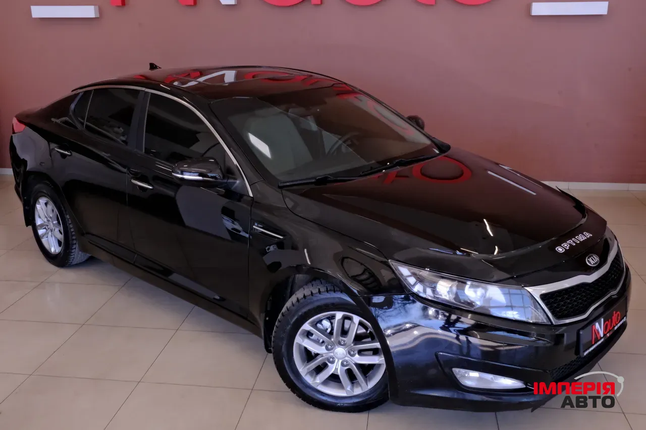 Kia Optima - фото 4