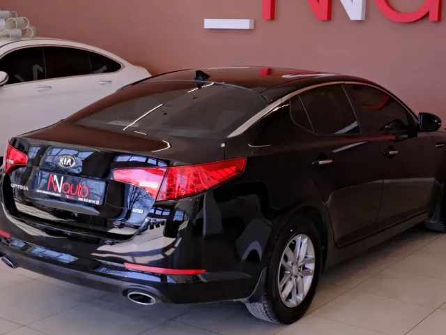 Kia Optima - фото 5
