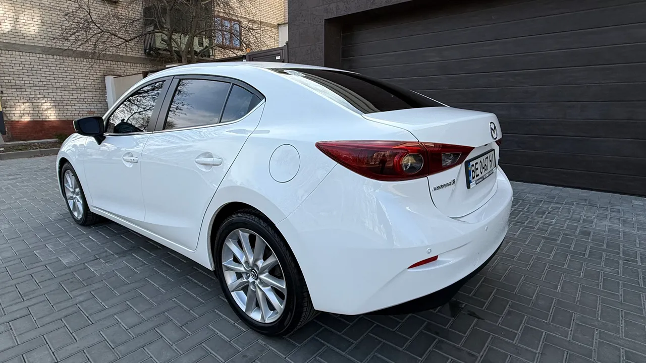 Mazda 3 - фото 8