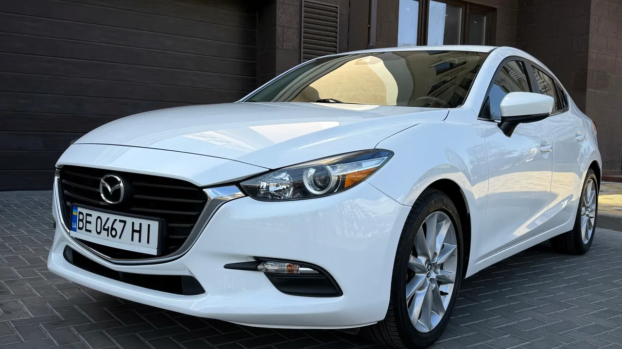 Mazda 3 - фото 2