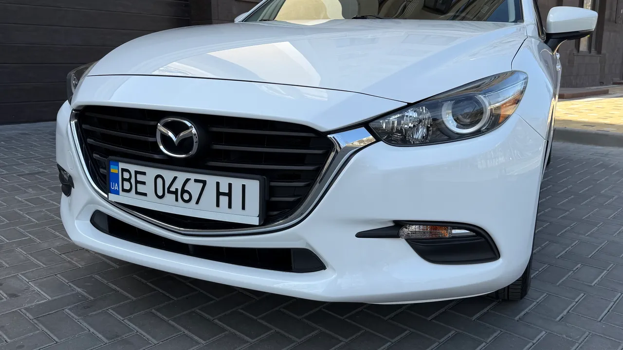 Mazda 3 - фото 12