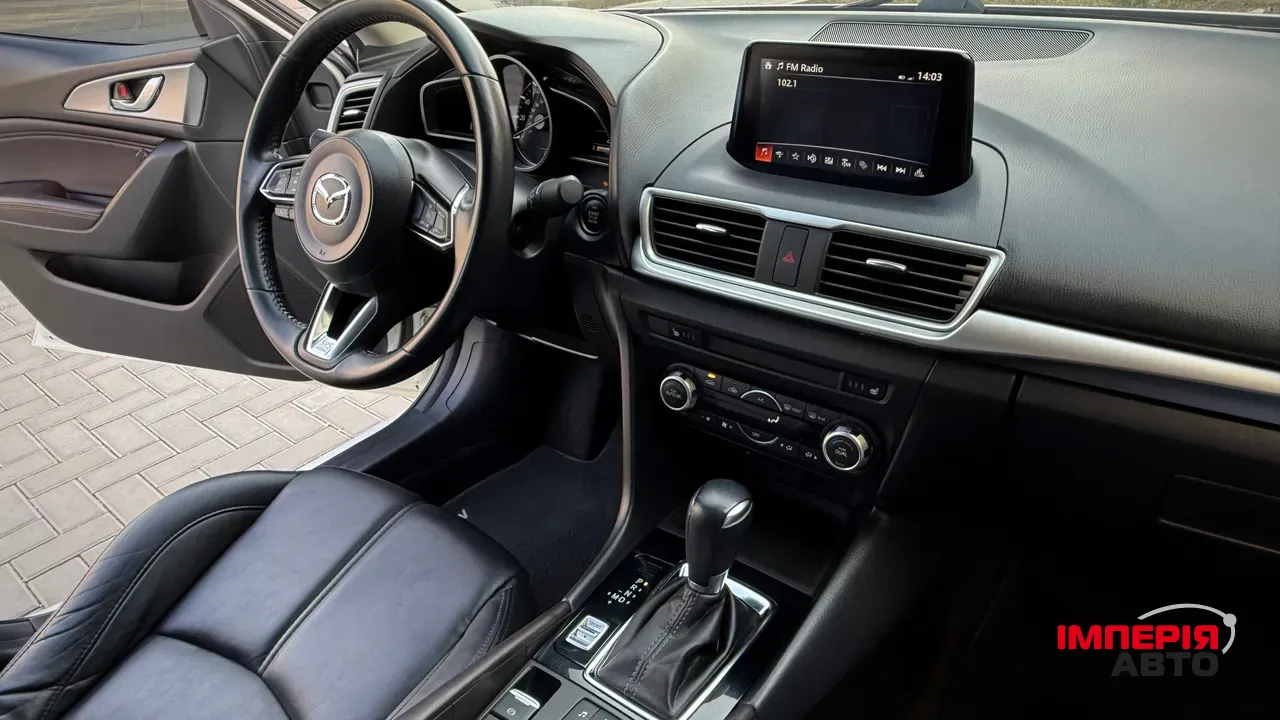 Mazda 3 - фото 22