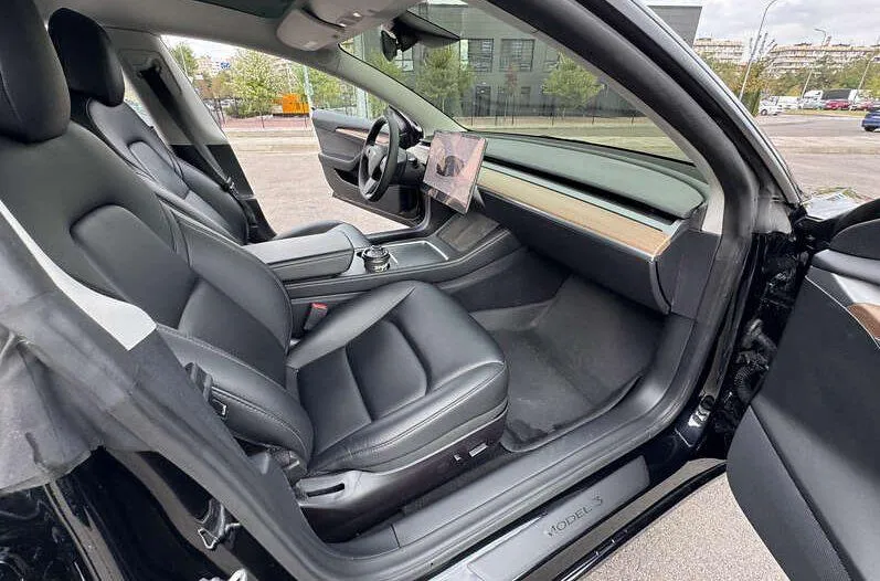 Tesla Model 3 - фото 9