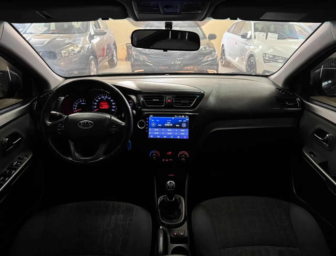 Kia Rio - фото 7