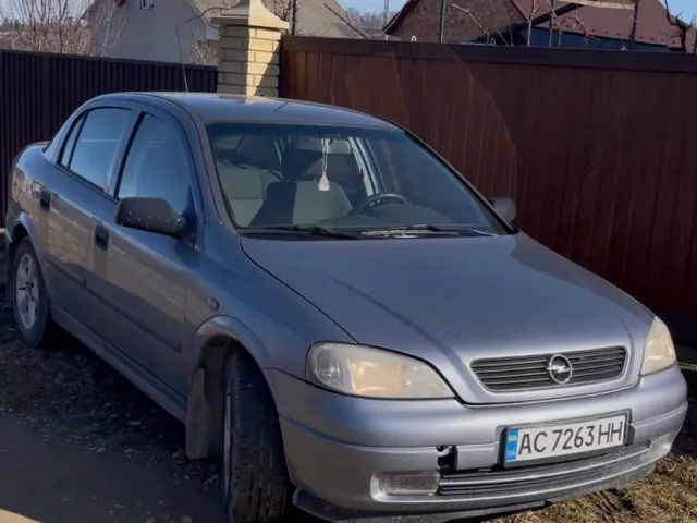 Opel Astra - фото 1