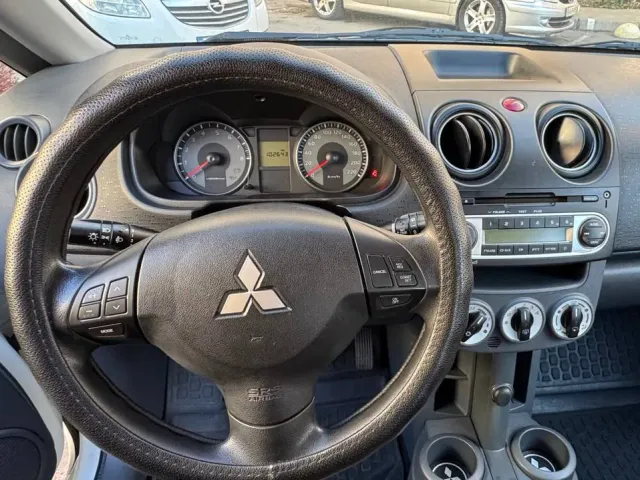 Mitsubishi Colt - фото 4