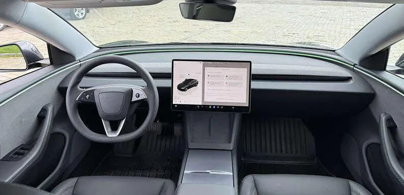 Tesla Model 3 - фото 12