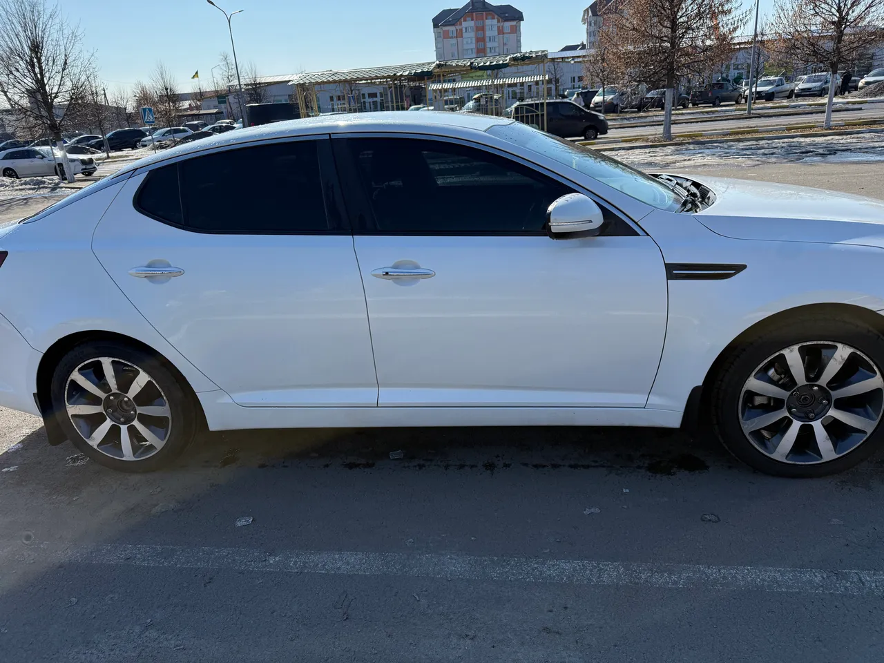 Kia Optima - фото 10
