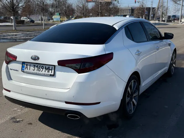 Kia Optima - фото 5