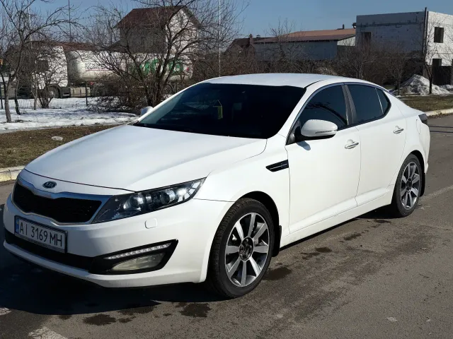 Kia Optima - фото 1