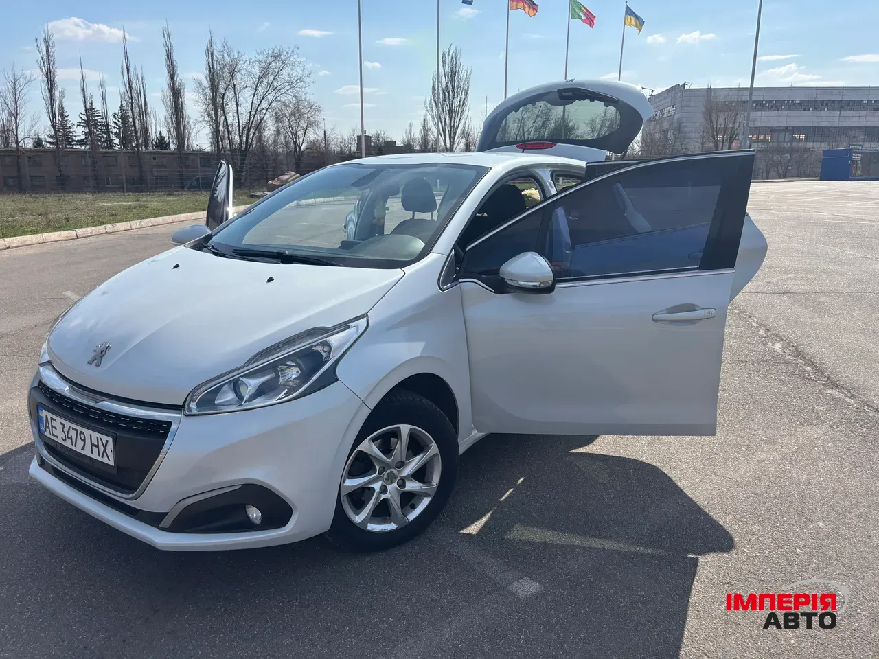 Peugeot 208 - фото 10