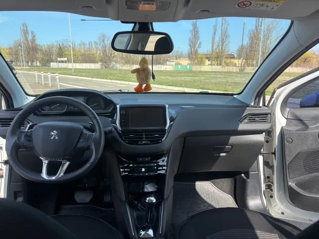 Peugeot 208 - фото 4