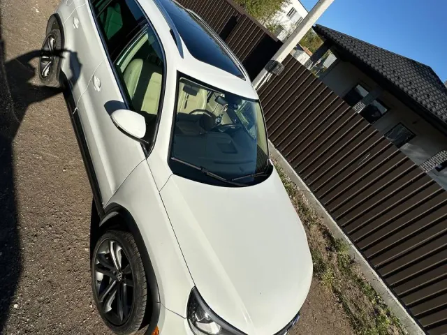 Volkswagen Tiguan - фото 2