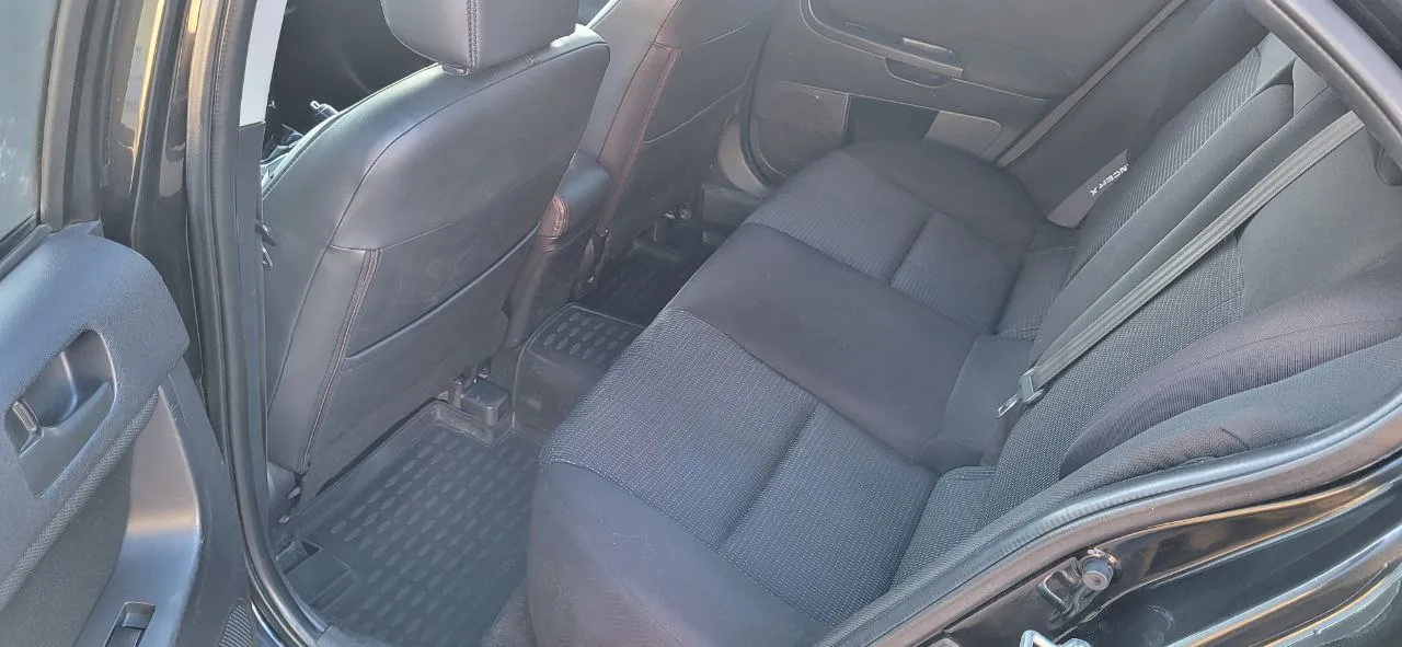 Mitsubishi Lancer - фото 8