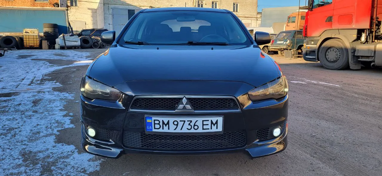 Mitsubishi Lancer - фото 1