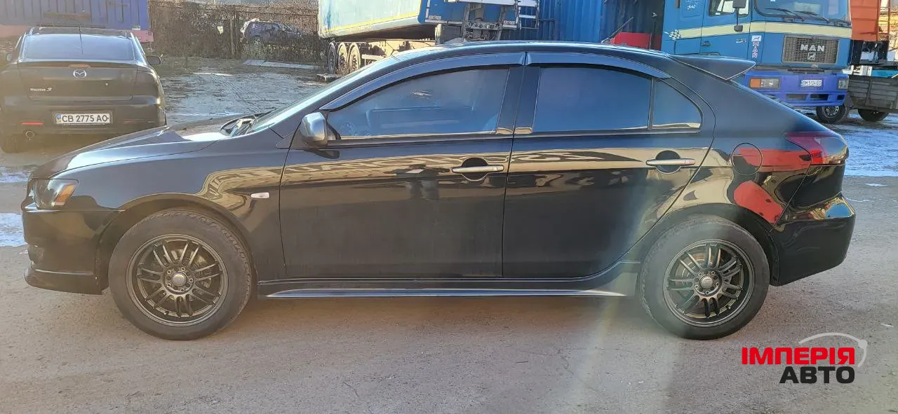 Mitsubishi Lancer - фото 3