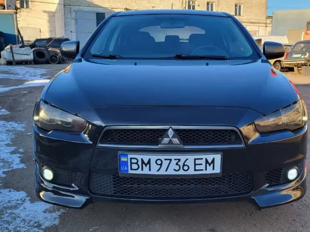 Mitsubishi Lancer - фото 1