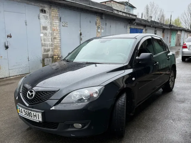 Mazda 3 - фото 1