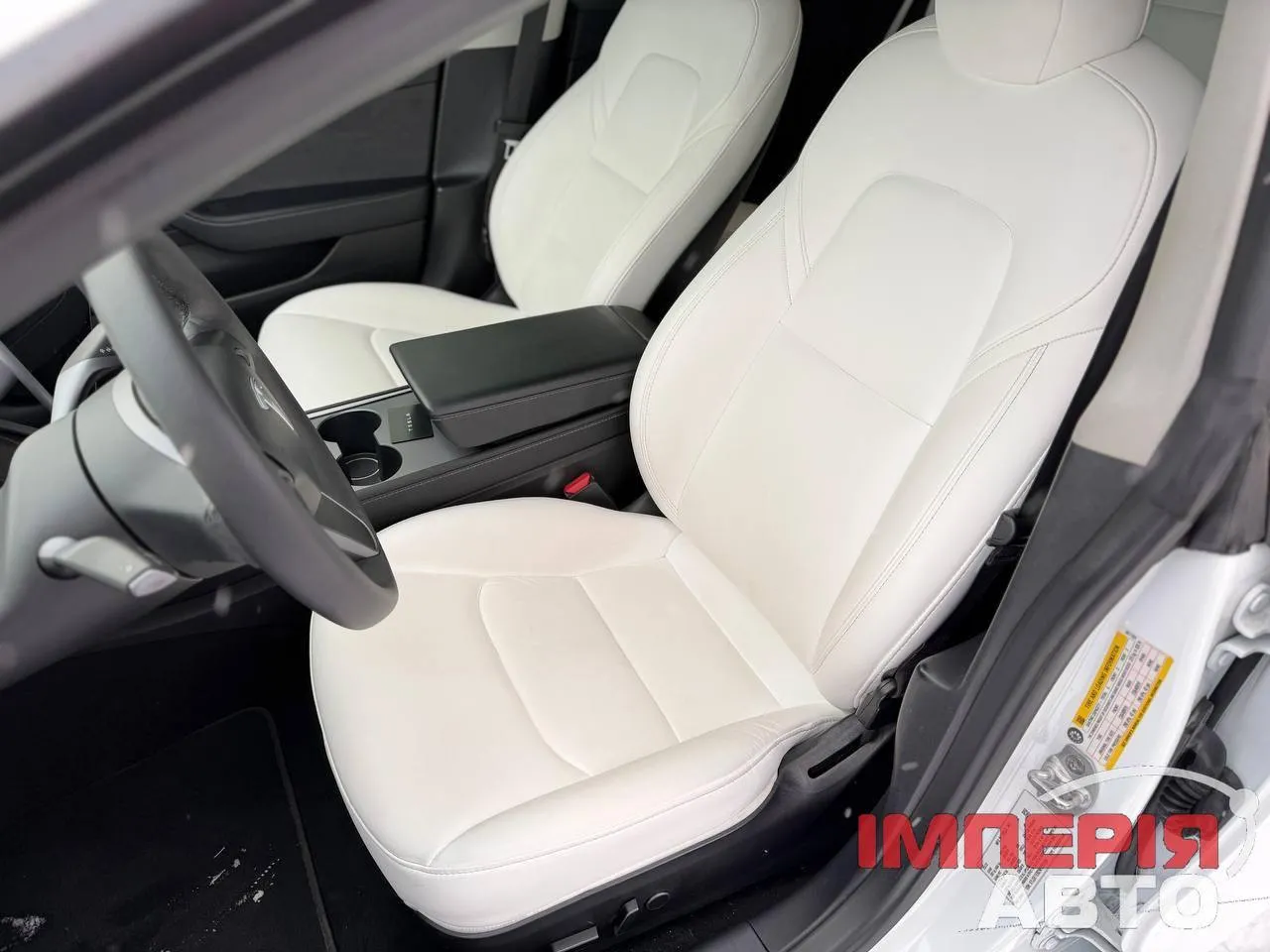 Tesla Model 3 - фото 7