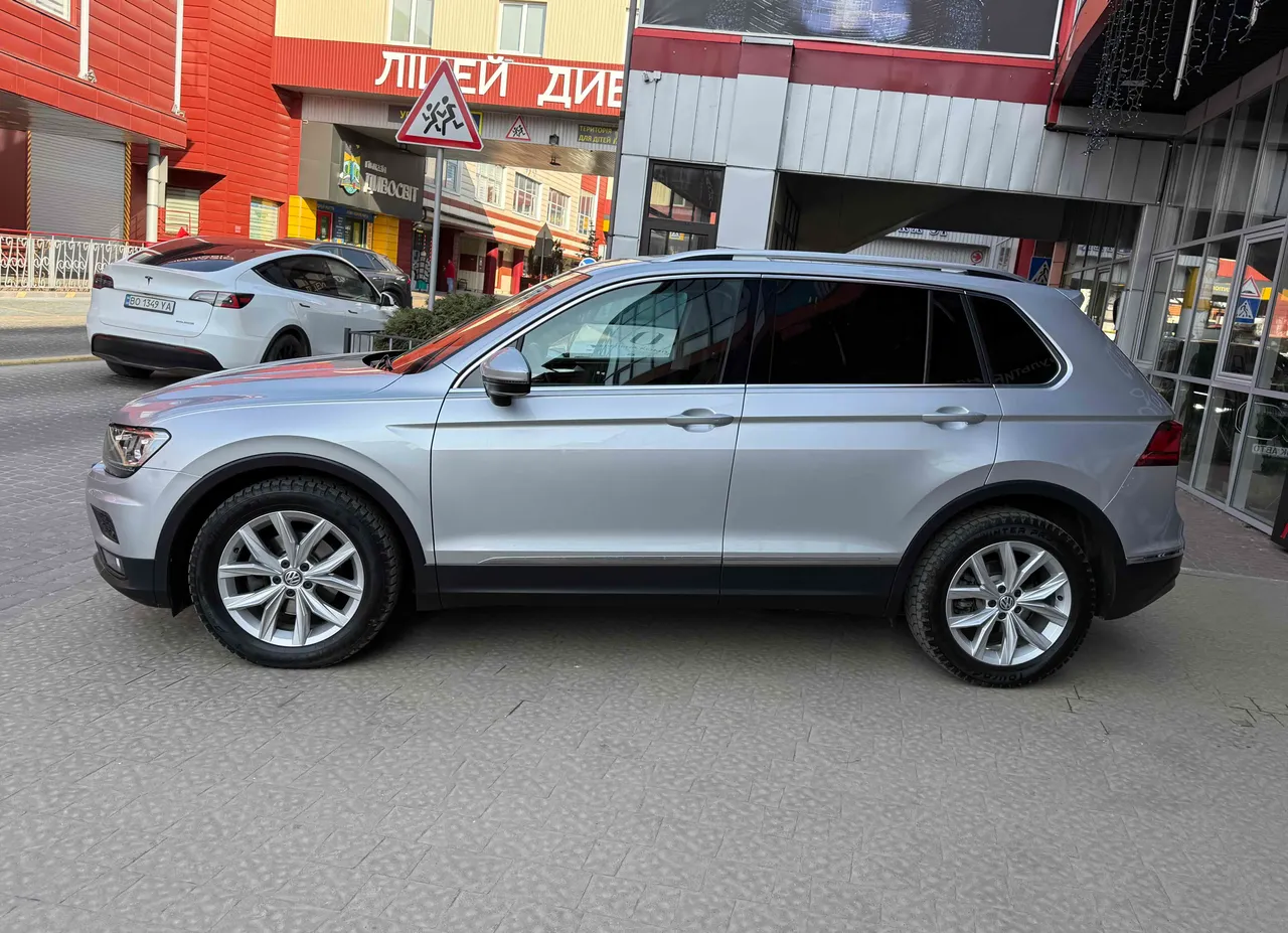 Volkswagen Tiguan - фото 9