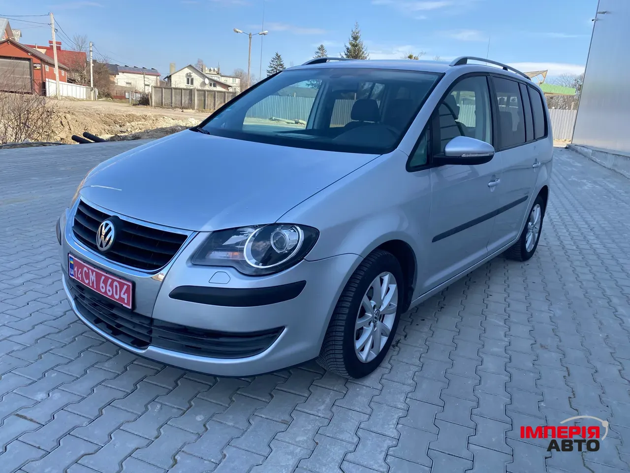 Volkswagen Touran - фото 1