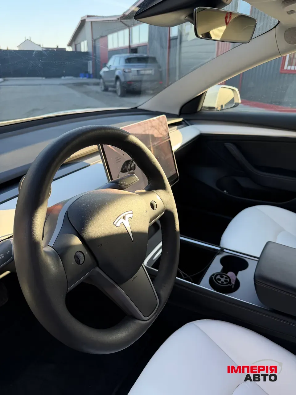 Tesla Model 3 - фото 13