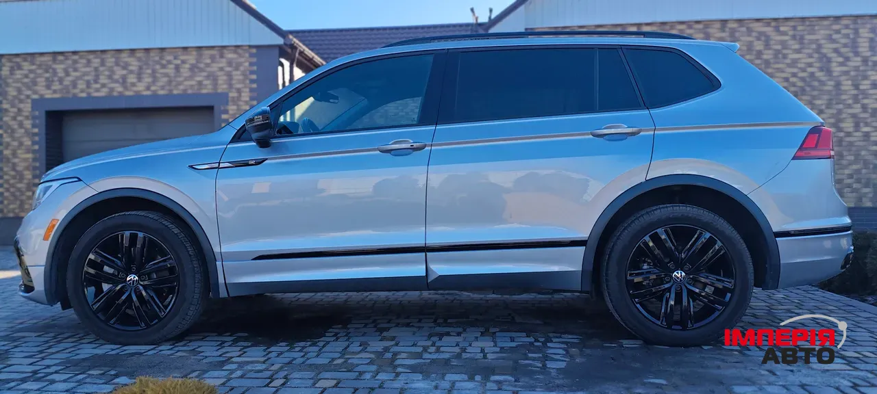 Volkswagen Tiguan - фото 11