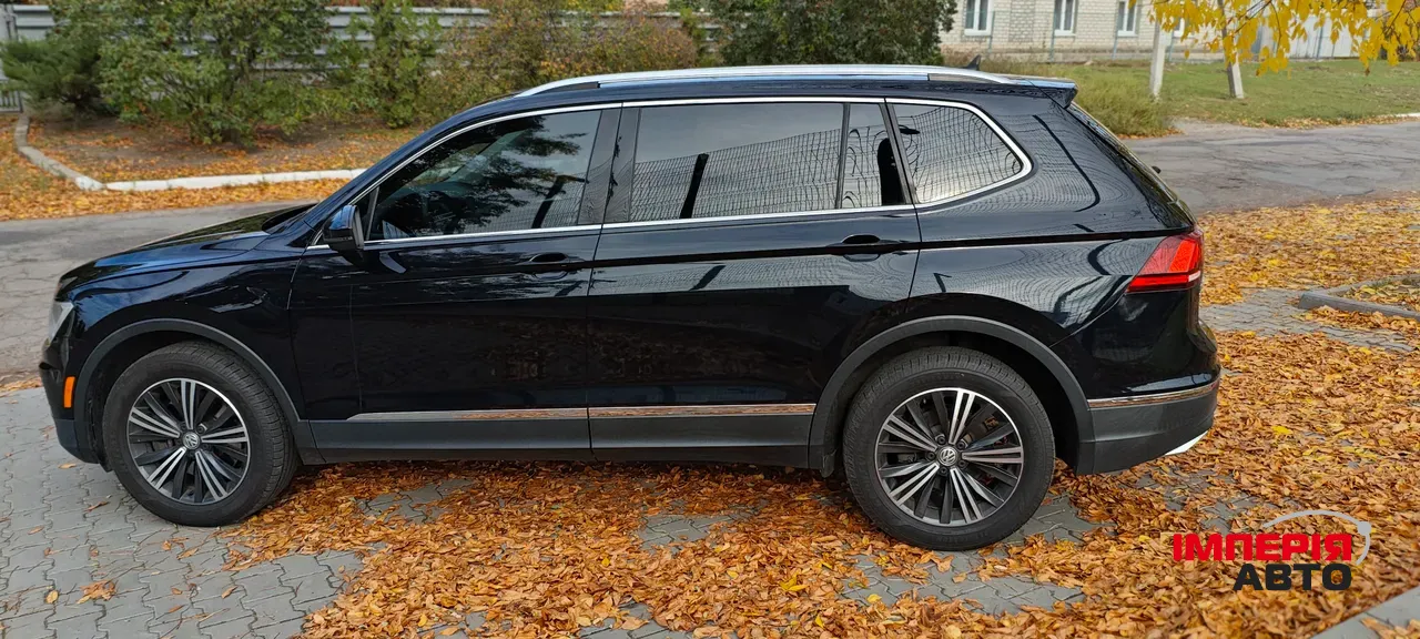 Volkswagen Tiguan - фото 11