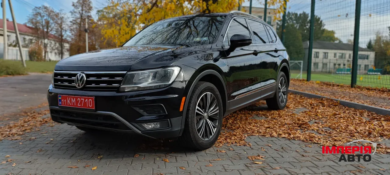 Volkswagen Tiguan - фото 1