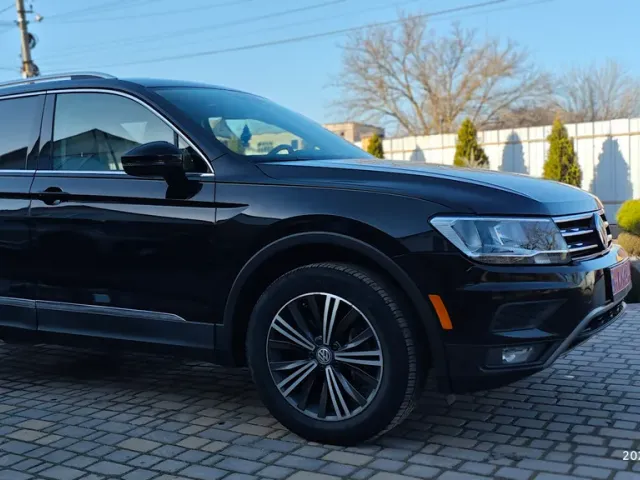 Volkswagen Tiguan - фото 2