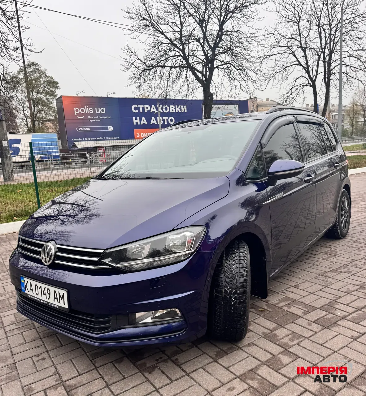Volkswagen Touran - фото 1