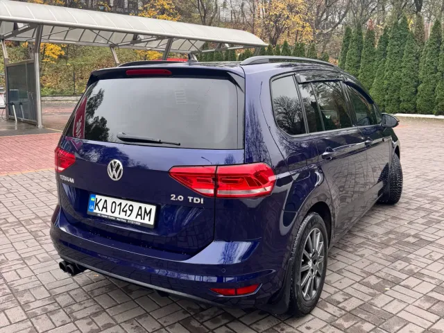Volkswagen Touran - фото 4