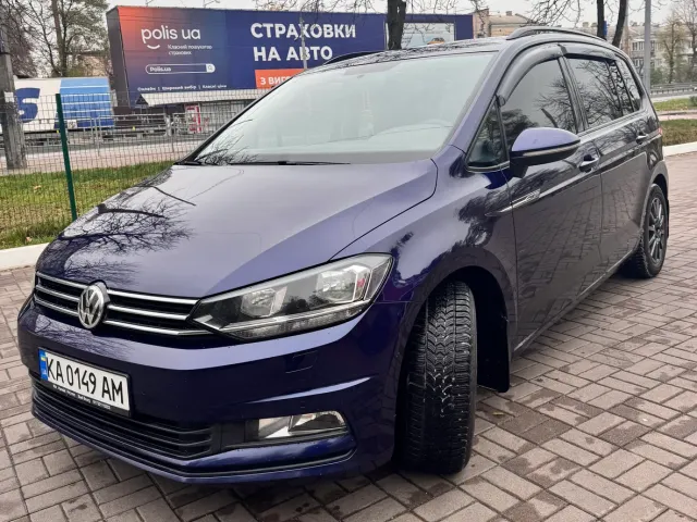 Volkswagen Touran - фото 1