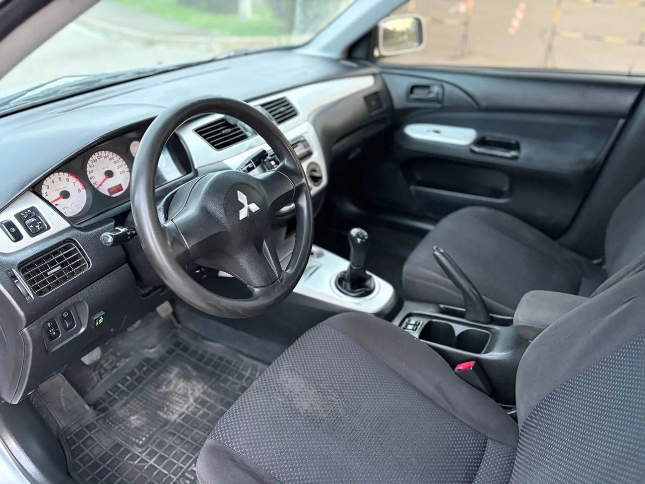 Mitsubishi Lancer - фото 8