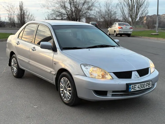 Mitsubishi Lancer - фото 1