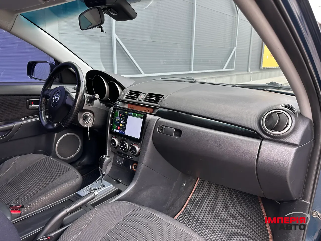 Mazda 3 - фото 23