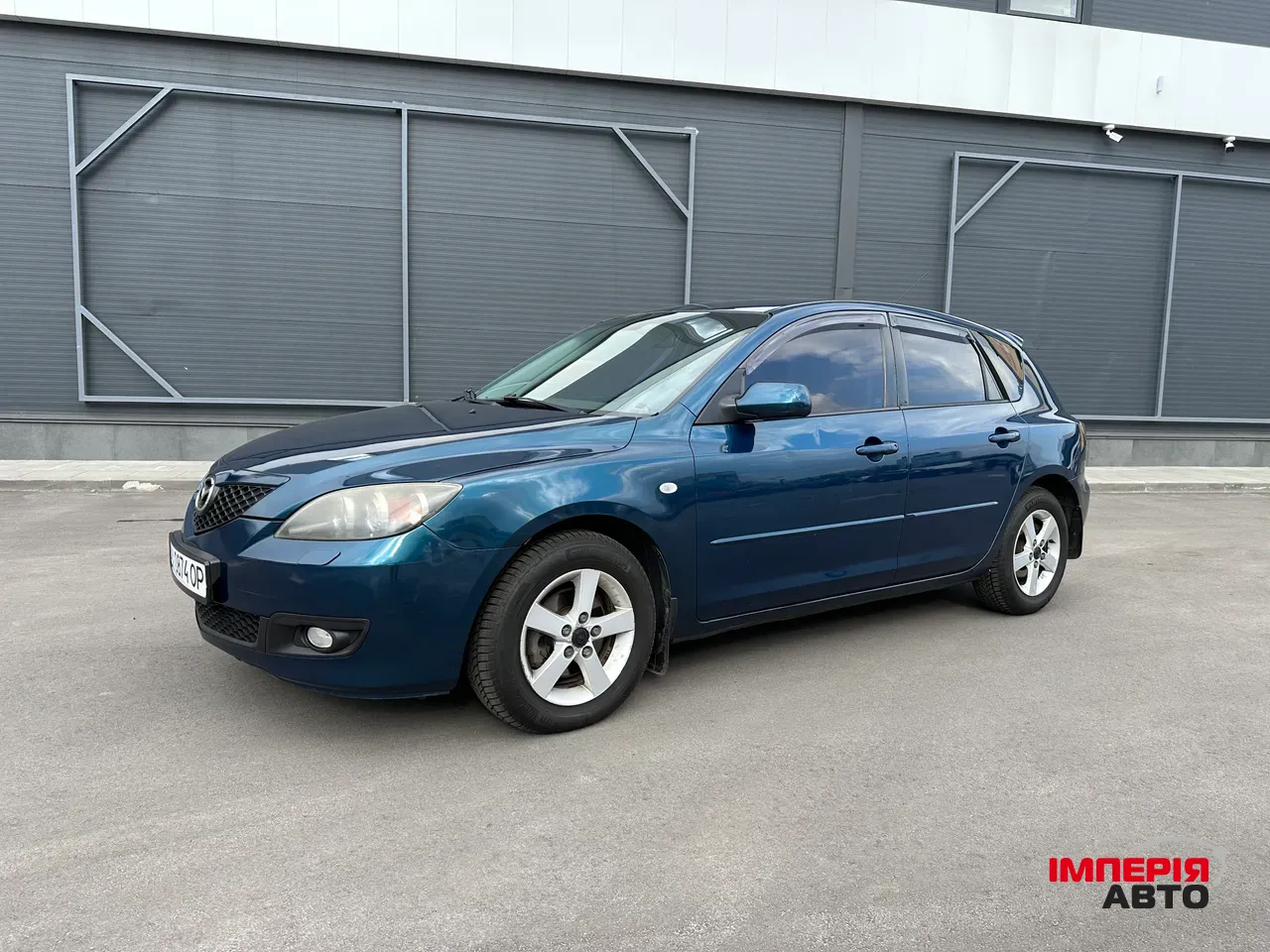 Mazda 3 - фото 1