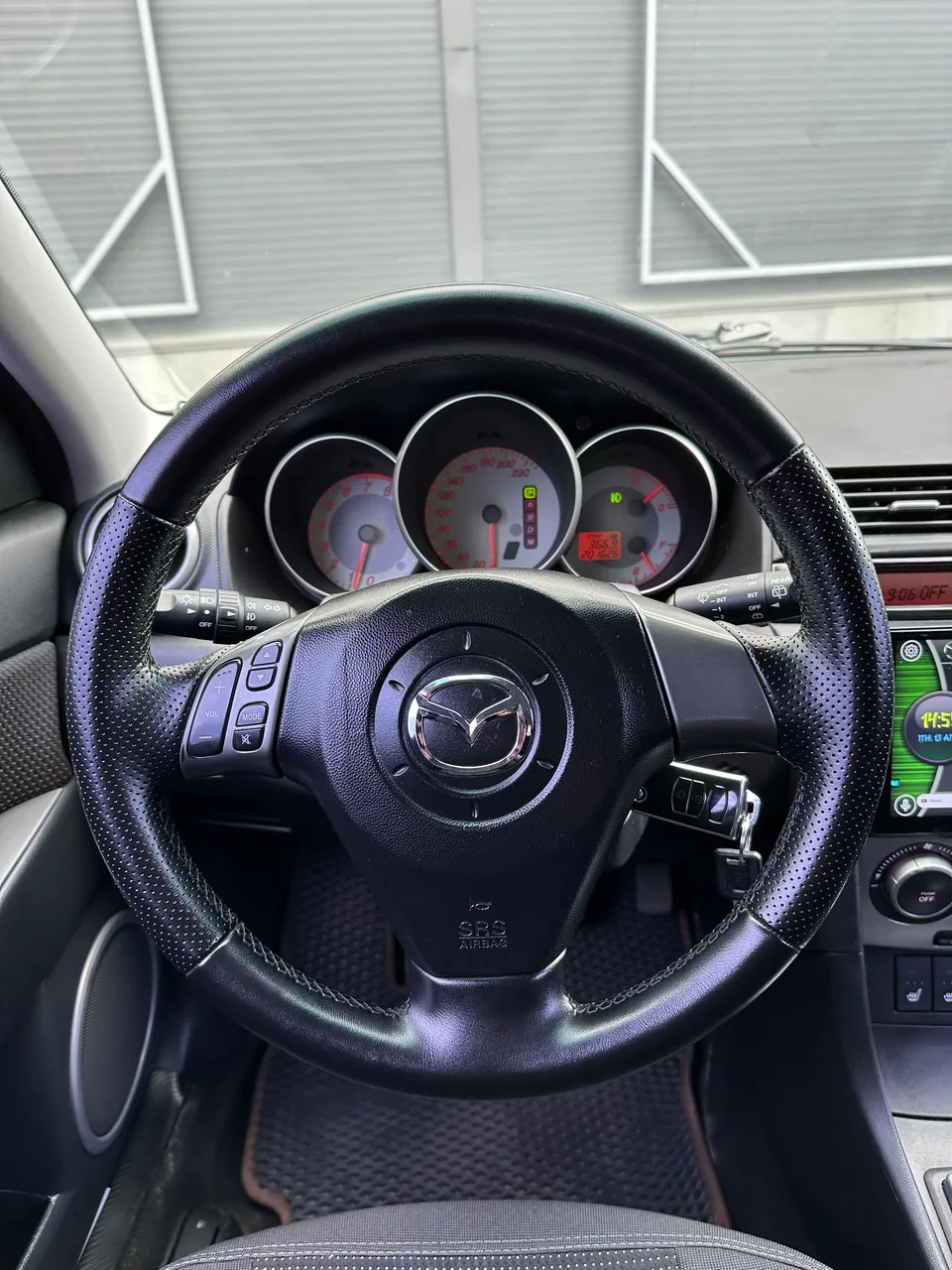 Mazda 3 - фото 13