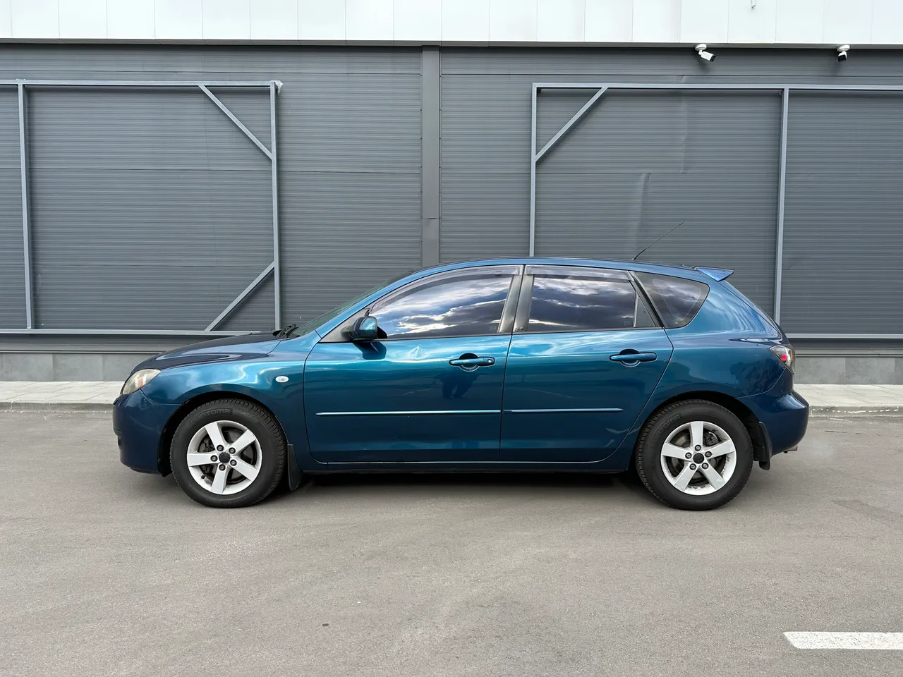 Mazda 3 - фото 6