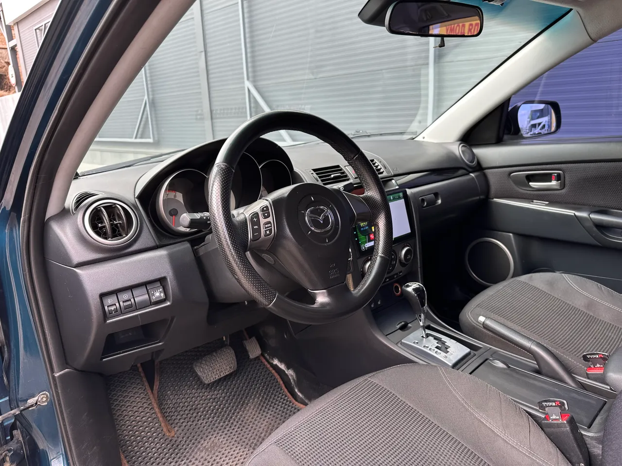 Mazda 3 - фото 16