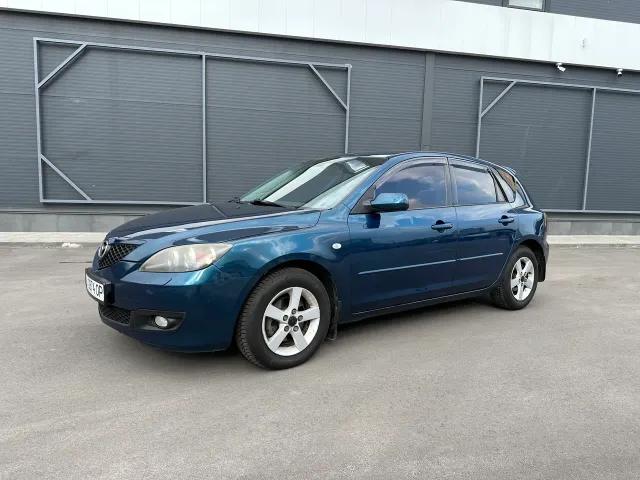 Mazda 3 - фото 1