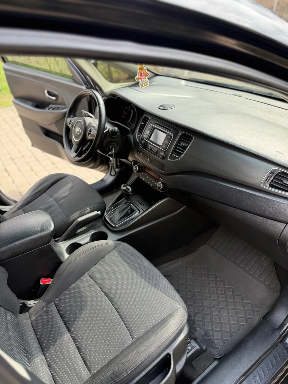 Kia Carens - фото 11