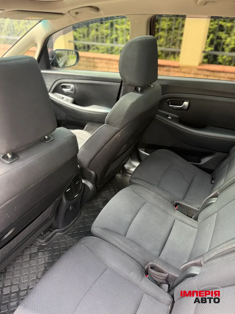 Kia Carens - фото 10