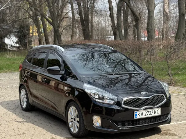 Kia Carens - фото 4