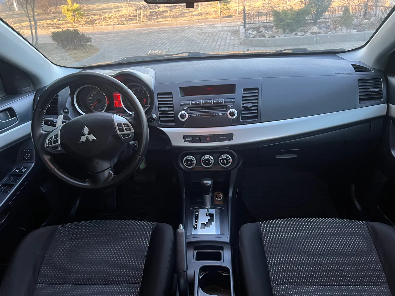 Mitsubishi Lancer - фото 20