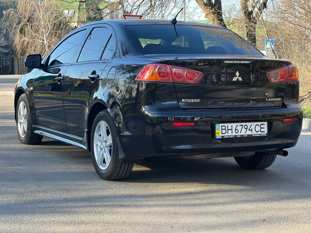 Mitsubishi Lancer - фото 4