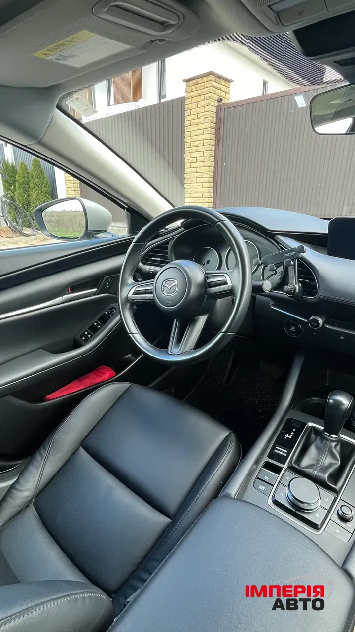 Mazda 3 - фото 23
