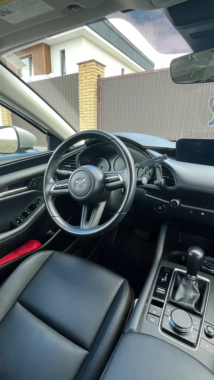 Mazda 3 - фото 22