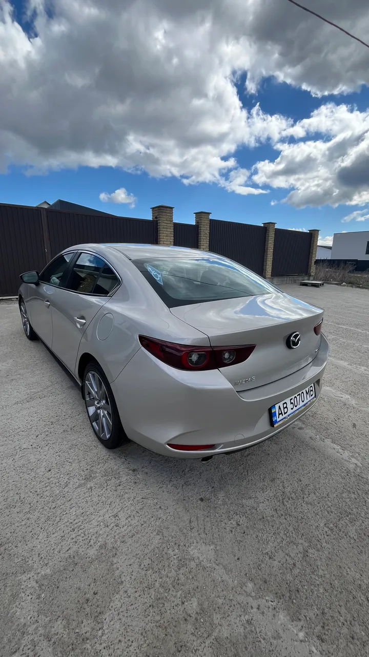 Mazda 3 - фото 6
