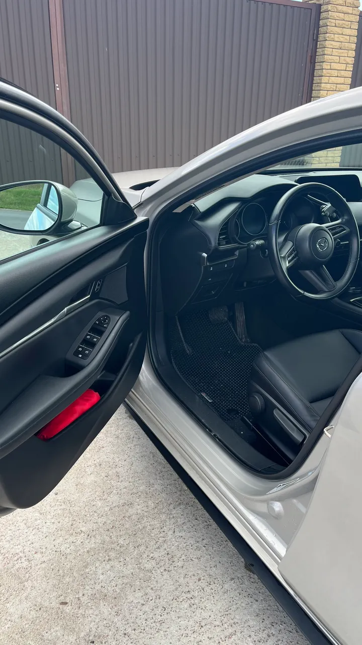 Mazda 3 - фото 18